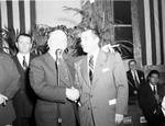 Peter W. Rodino shakes hands during a speech by Ace (Armando) Alagna, 1925-2000
