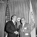 Vice President Hubert Humphrey shaking hands with judge by Ace (Armando) Alagna, 1925-2000