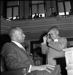 NJ State Assembly member Ronald Owens and son in the Assembly chamber by Ace (Armando) Alagna, 1925-2000