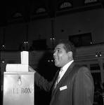 NJ State Assembly member George C. Richardson in front of the bill box by Ace (Armando) Alagna, 1925-2000