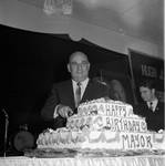Mayor of Newark, NJ Hugh Addonizio cuts his birthday cake by Ace (Armando) Alagna, 1925-2000