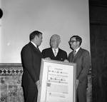 Presenting a citation in honor of the establishment of the New Jersey State Rehabilitation Commission by Ace (Armando) Alagna, 1925-2000